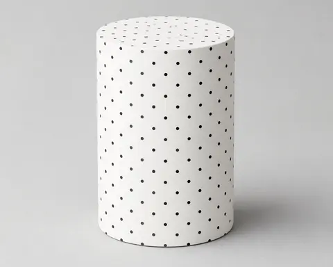 Minh họa cho “Hoa văn bề mặt”: a plain white cylinder covered only in small evenly spaced black dots.